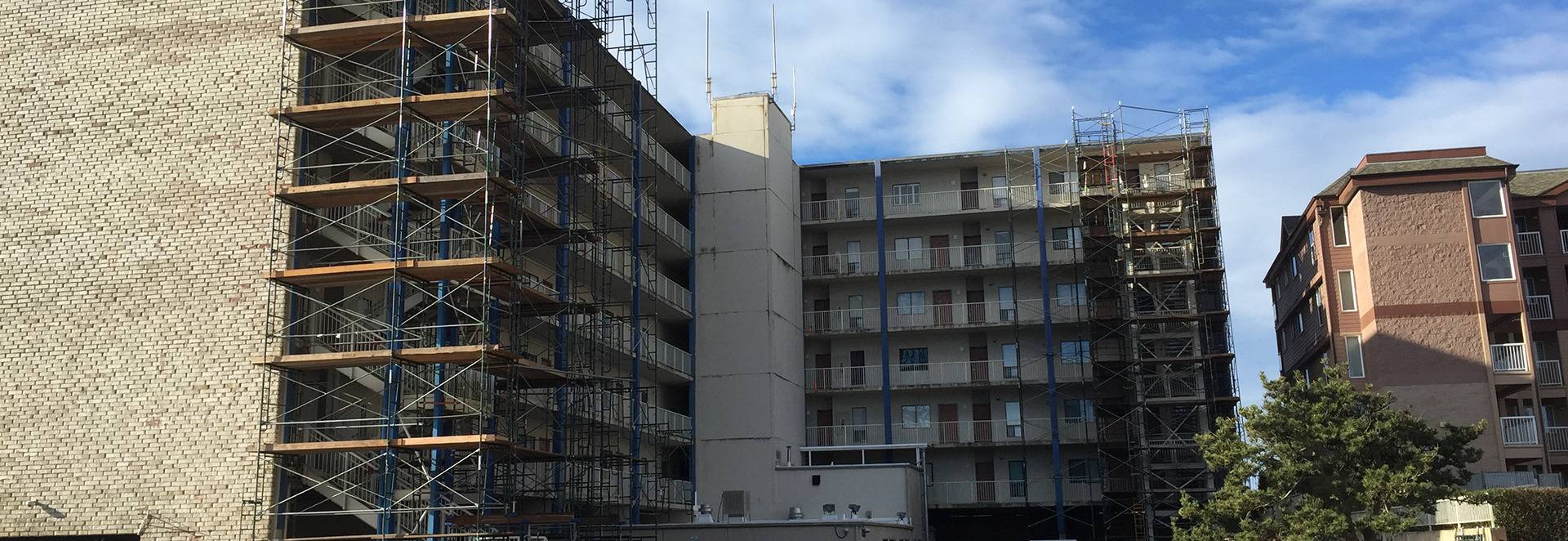 Commercial scaffolding installed on multistory apartment complex.